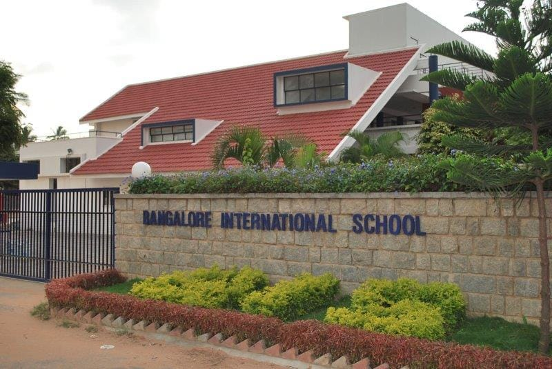 The Bangalore International School entrance gate and campus building